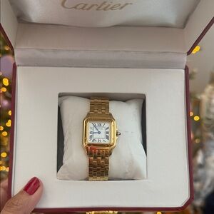 Gold Timepiece with White Dial